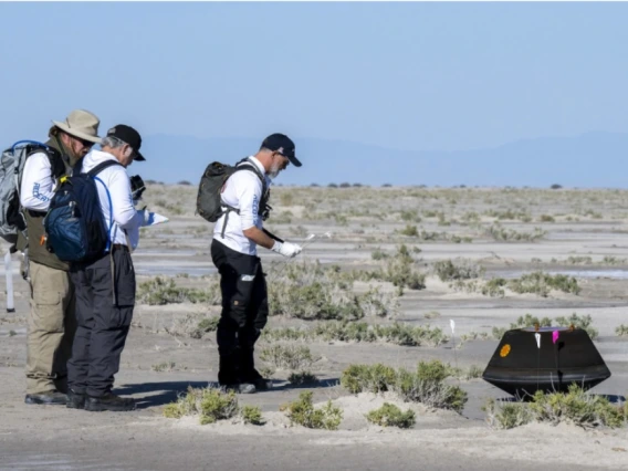 Dante Lauretta (right), U of A Regents Professor and OSIRIS-REx principal investigator, collects science data with NASA Astromaterials Curator Francis McCubbin and NASA Sample Return Capsule Science Lead Scott Sandford shortly after the sample return capsule from NASA's OSIRIS-REx mission landed at the Department of Defense's Utah Test and Training Range on Sept. 24, 2023. The sample was collected from the asteroid Bennu in October 2020.